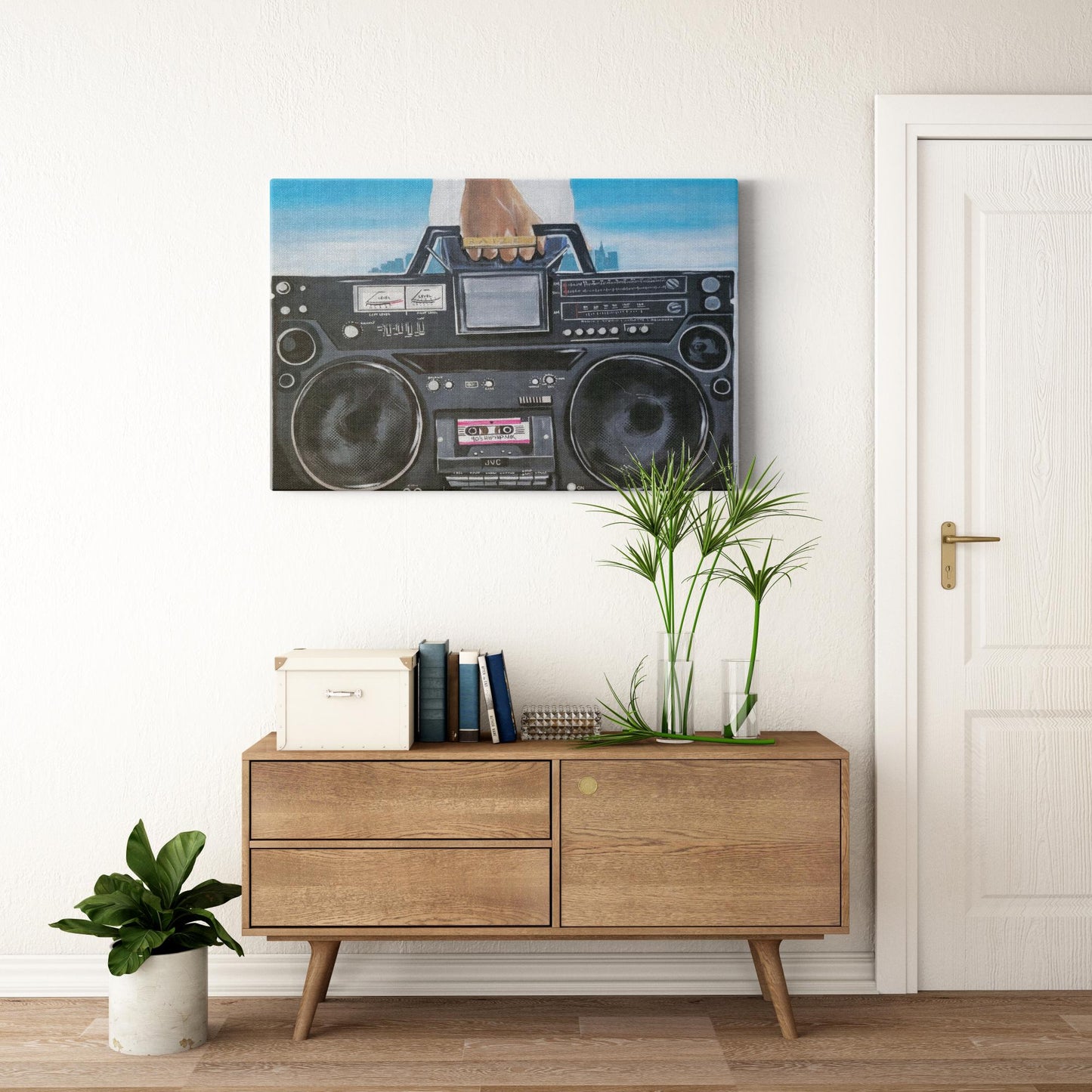 Painting titled “My Boom Box” showing a man in a white T-shirt holding a boombox with a BAIZE ring on his fingers and a faint city skyline in the background.