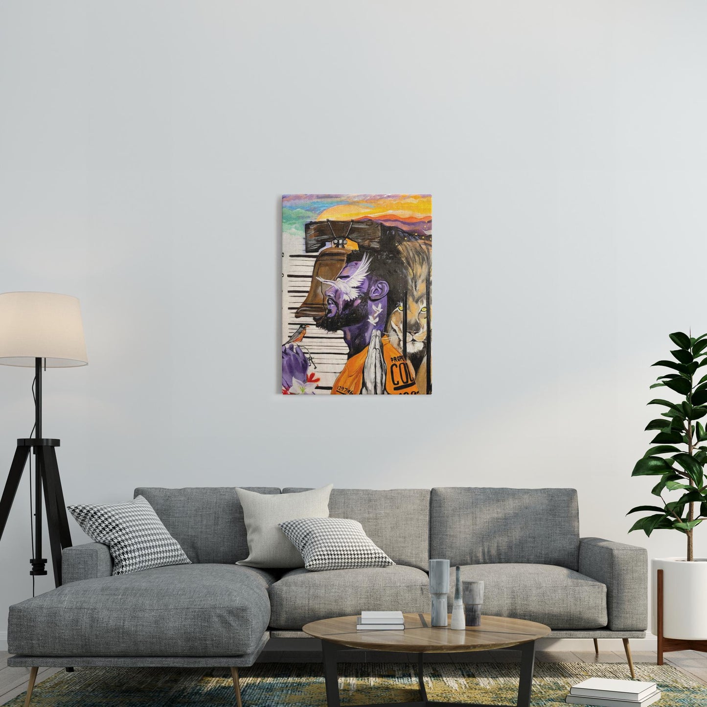 Painting titled “Give Me Liberty” showing a male in a prison jumpsuit kneeling in prayer with a symbolic lion behind bars, liberty bell, and doves representing freedom.