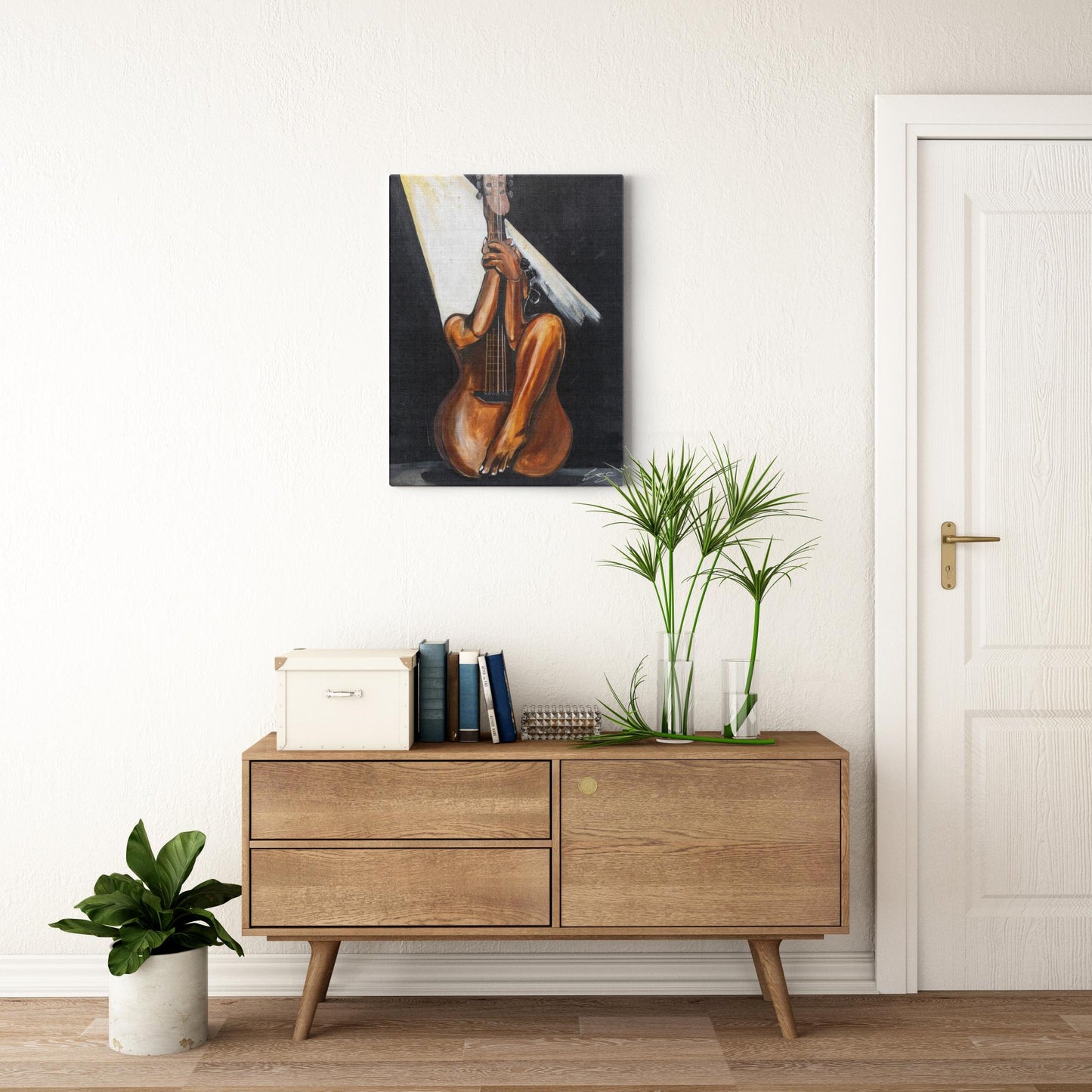 Abstract painting titled “Fine Tuned” showing a woman’s curved body merged with a guitar’s form, one leg extending upward into the neck of the instrument.