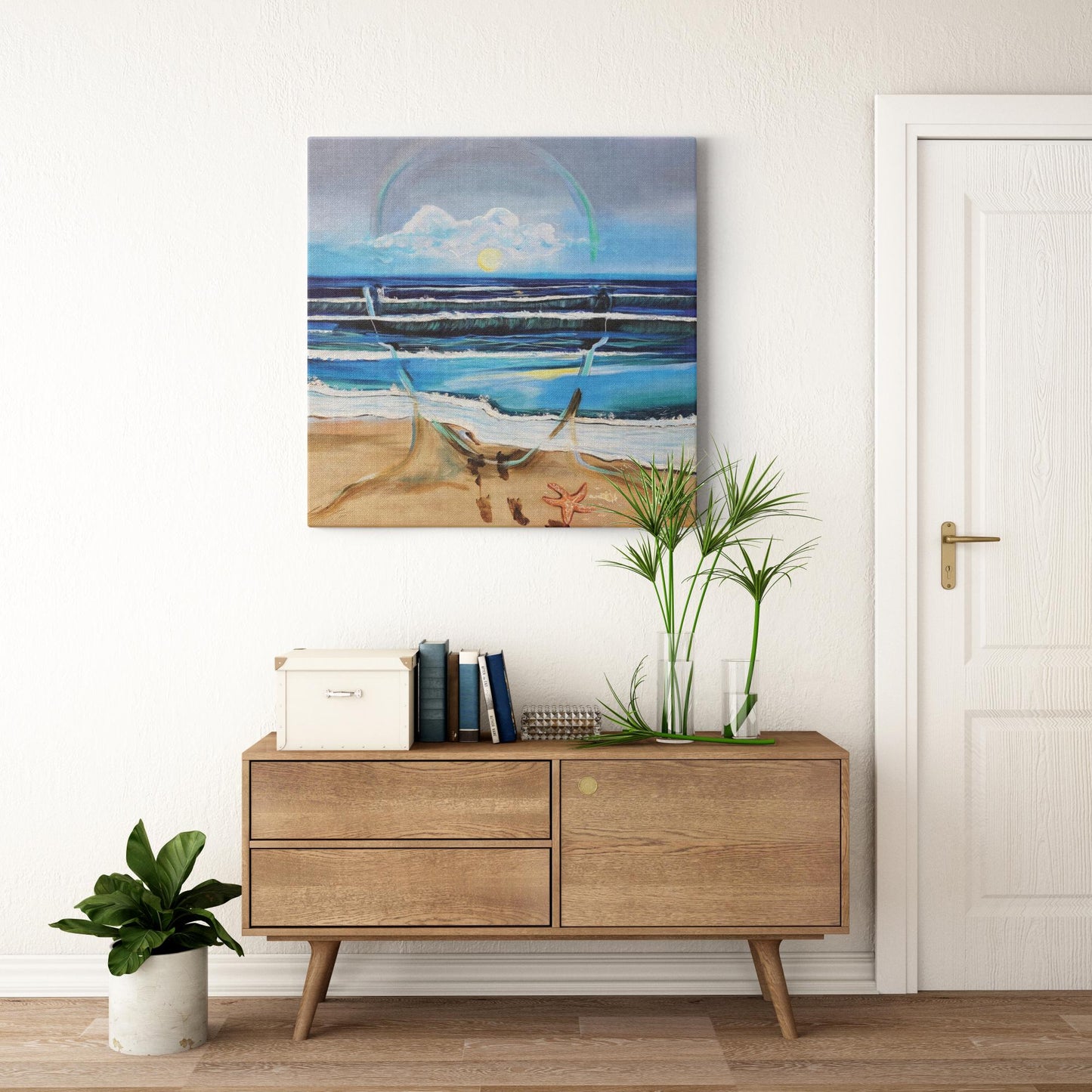 Painting titled “Fluent” showing an ocean scene blending with the outline of a male face, waves running into sand, starfish and shells, with a glowing sun symbolizing peace and focus.