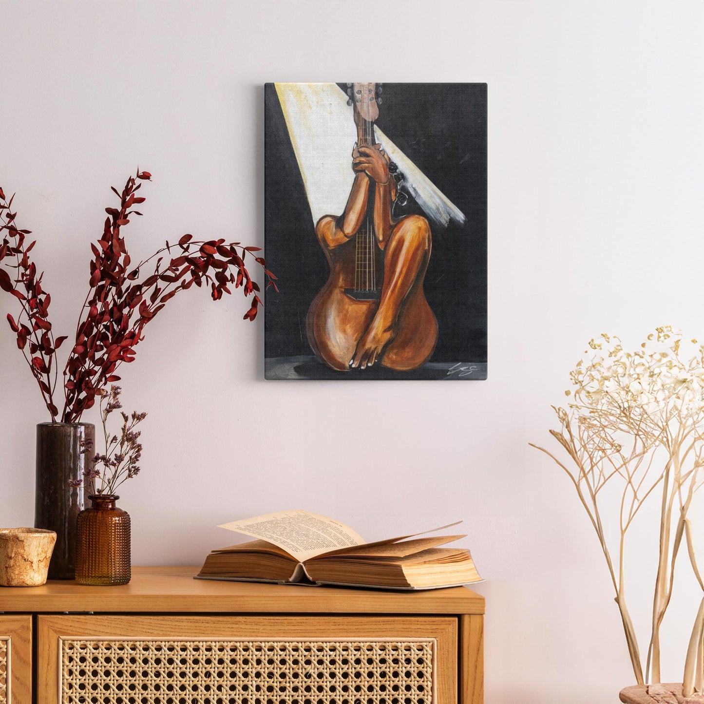 Abstract painting titled “Fine Tuned” showing a woman’s curved body merged with a guitar’s form, one leg extending upward into the neck of the instrument.