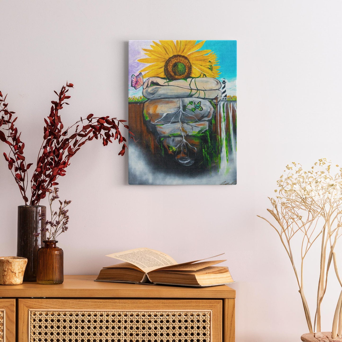 Surreal painting of two sunflowers growing through stone, symbolizing love, growth, and life with butterflies and a door, representing the heart."