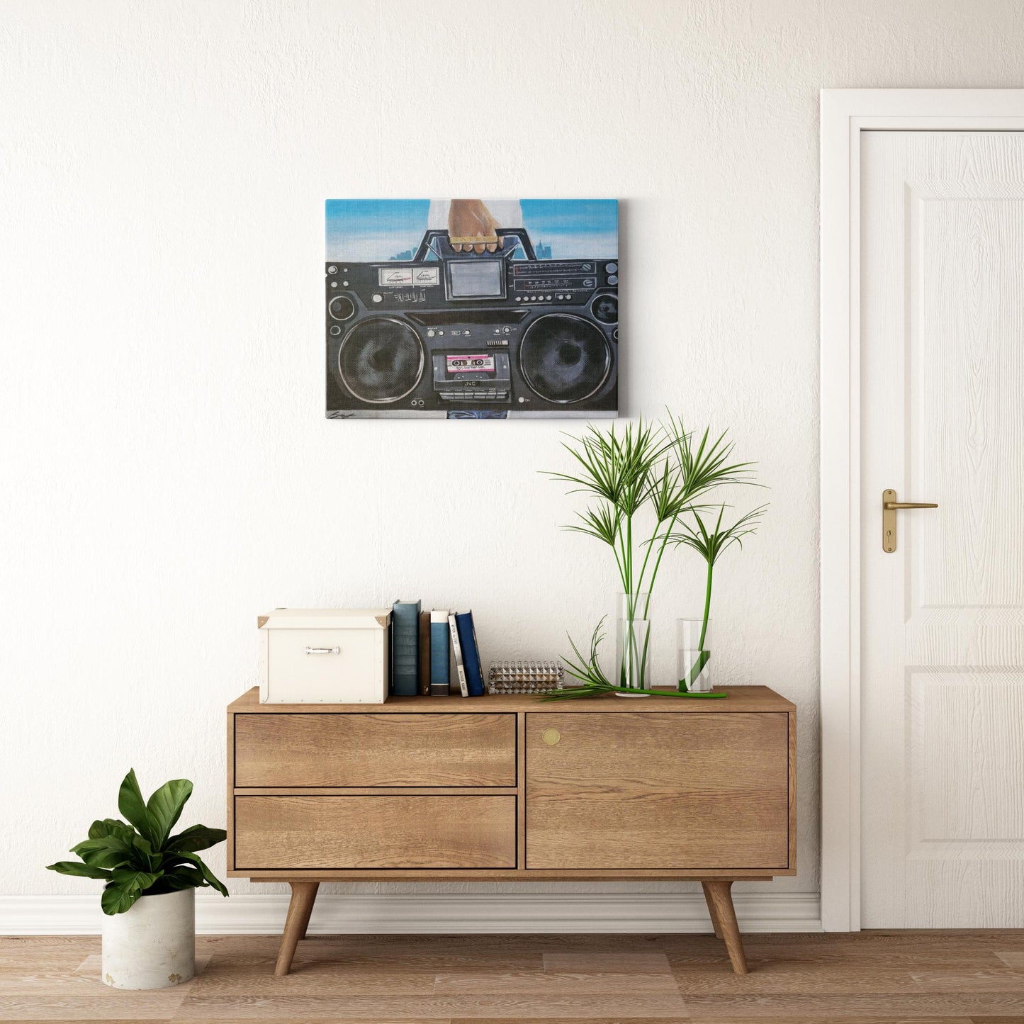 Painting titled “My Boom Box” showing a man in a white T-shirt holding a boombox with a BAIZE ring on his fingers and a faint city skyline in the background.