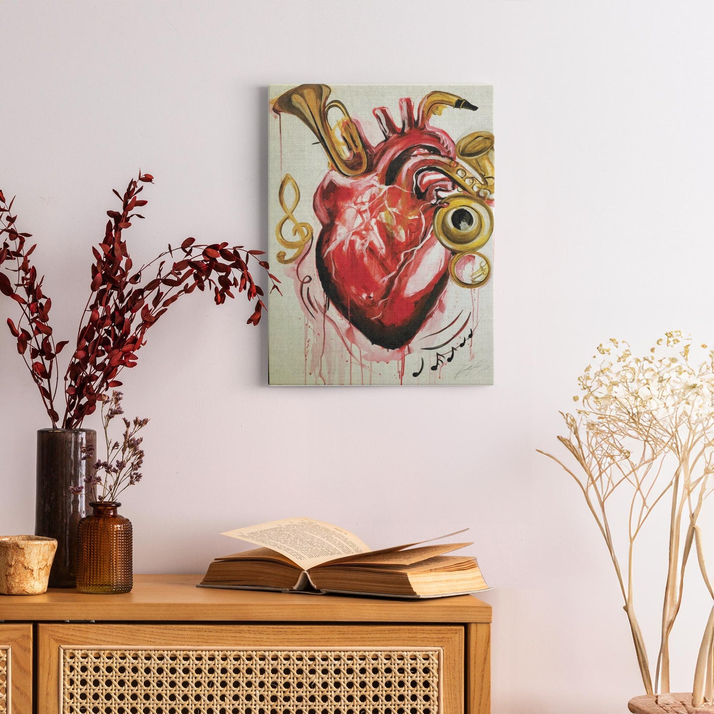 Abstract painting titled “From the Heart” showing musical instruments shaped like parts of a human heart—flutes, horns, and drums merging in surreal form.