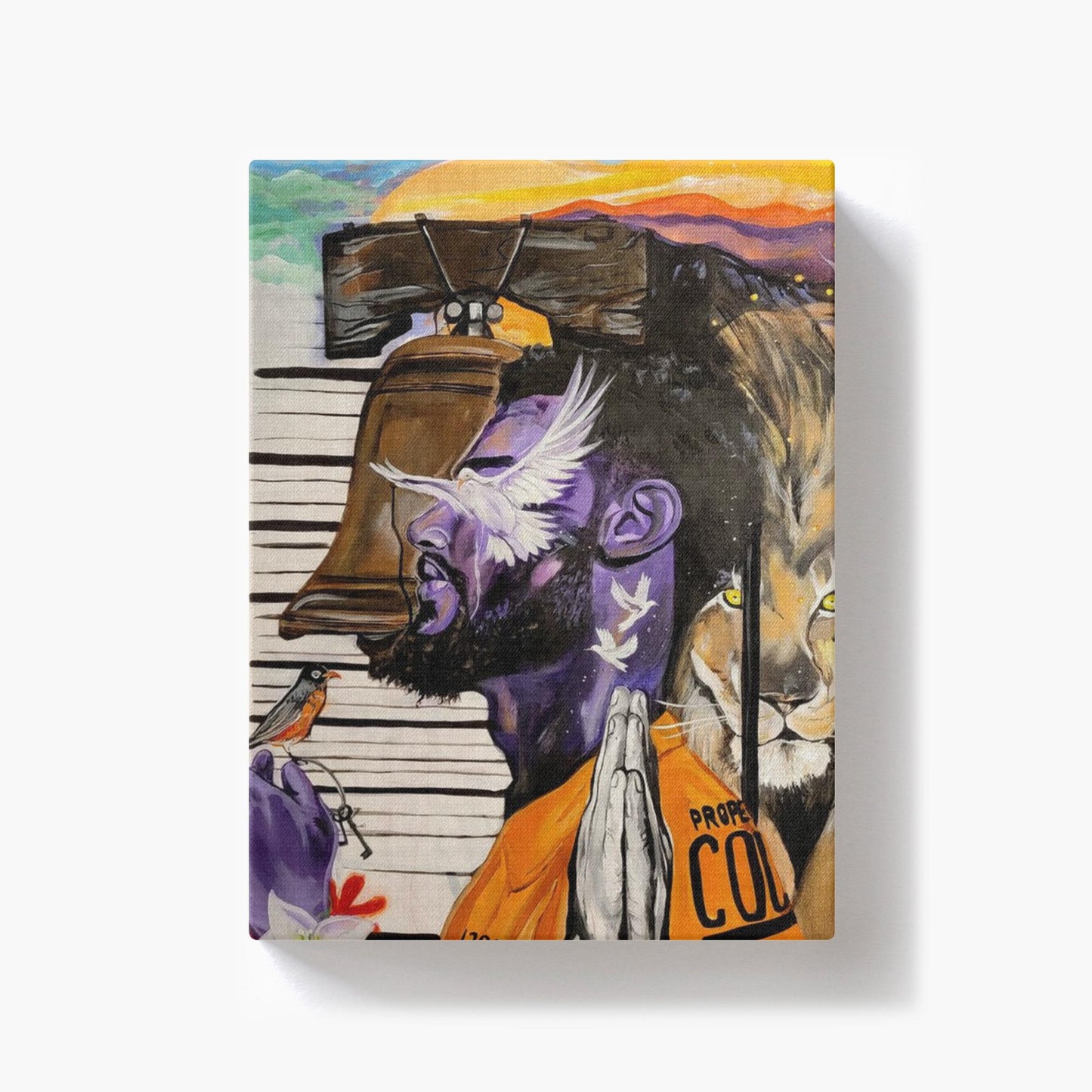 Painting titled “Give Me Liberty” showing a male in a prison jumpsuit kneeling in prayer with a symbolic lion behind bars, liberty bell, and doves representing freedom.