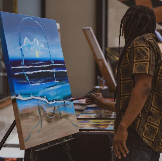 Raleigh, NC Artist B.j. Baize pictured Live Painting at Crabtree Valley Mall