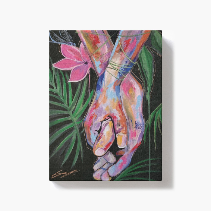 Colorful painting titled “One Accord” showing a woman’s hand holding a man’s hand with tropical flowers, palm leaves, and bright island-inspired colors.